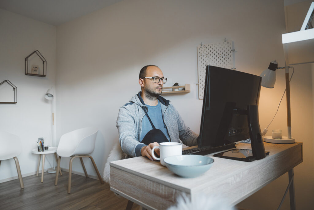 Man working on computer in the home office
